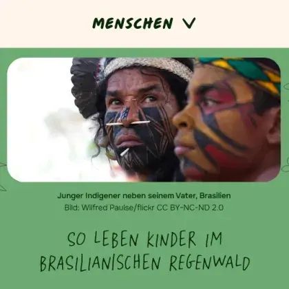 Man sieht zwei indigene Kinder mit Gesichts-Bemalung.