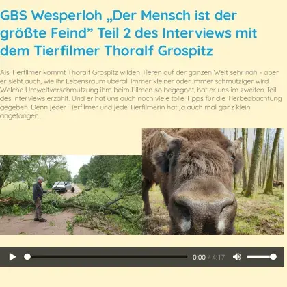 Man sieht ein Foto mit einer Tierschnauze und einem Tierfilmer.