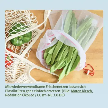 Man sieht Gemüse in einem Frischenetz.