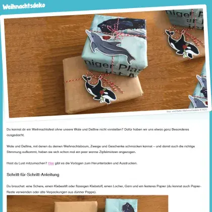 Man sieht Geschenke mit Walen und Delfinen.